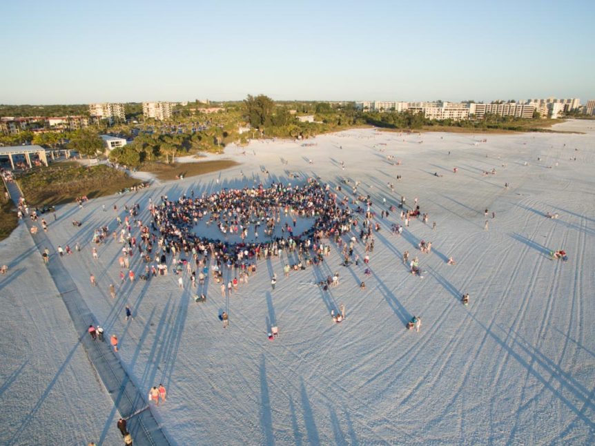 siesta-key-drum-circle-aerial-view-dotting-the-map